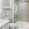 Modern rental home bathroom with glass showers inside units at Canvas on Founders Hill