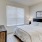 Furnished bedroom inside a home at Canvas on Founders Hill