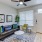 Furnished living room and front entrance inside a home at Canvas on Founders Hill
